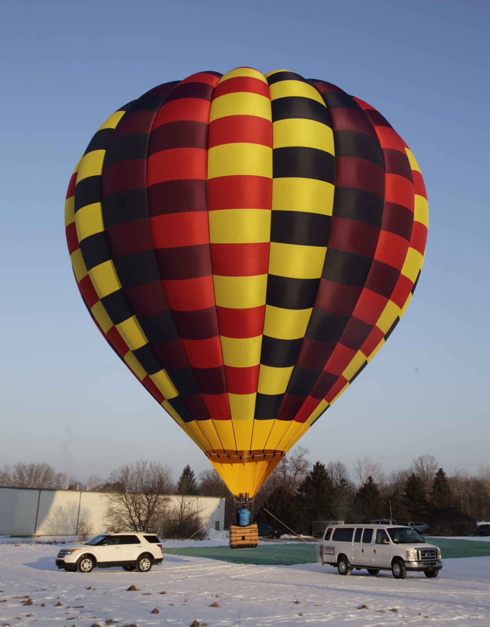 Cameron A-120 hot air balloon in a snowy landscape