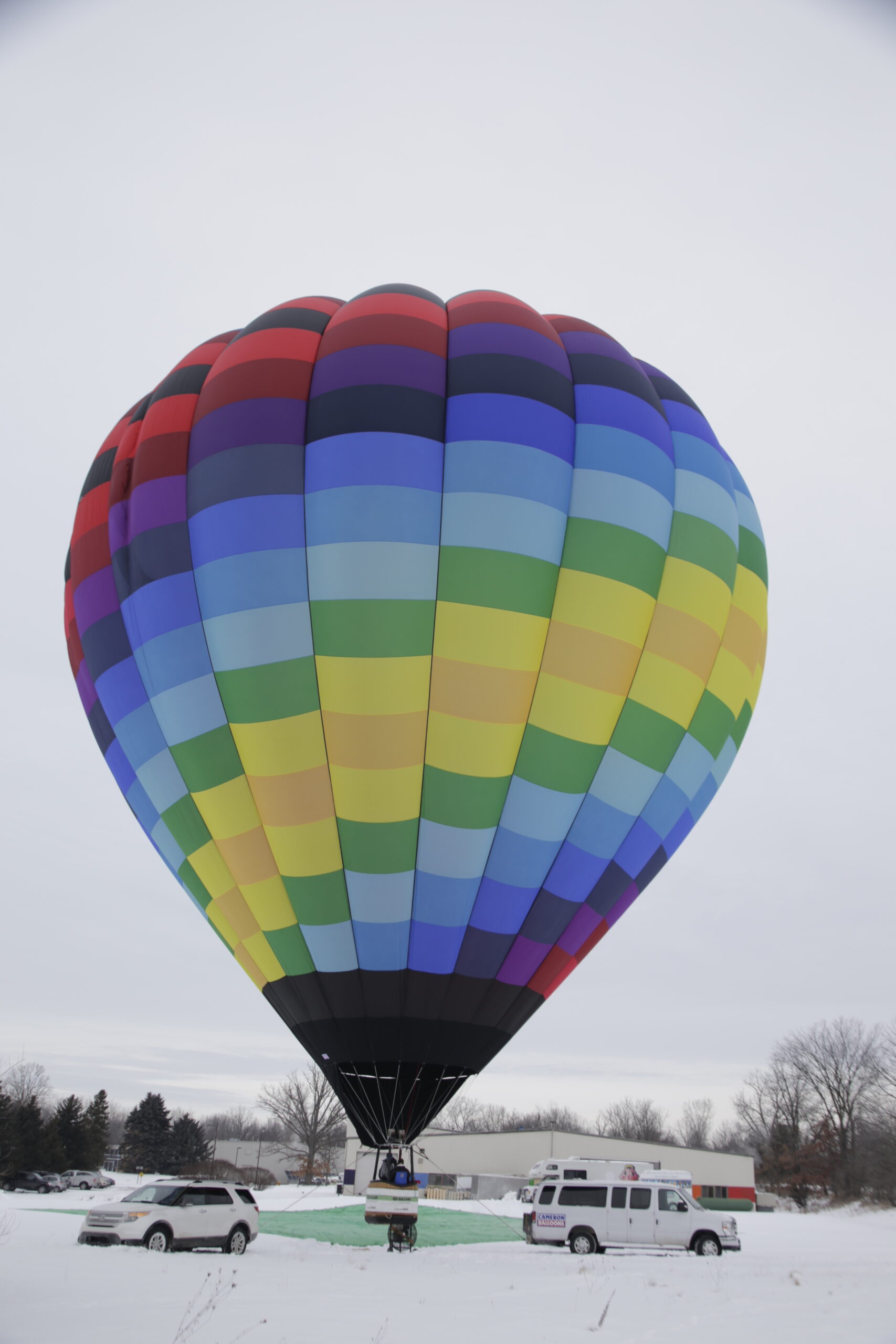 Cameron A-225 hot air balloon in a snowy landscape
