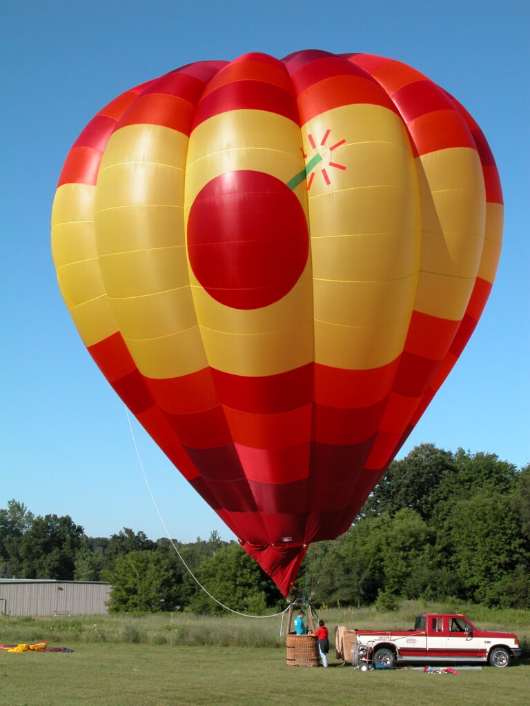 Cameron lightweight O-65 hot air balloon with custom cherry bomb artwork