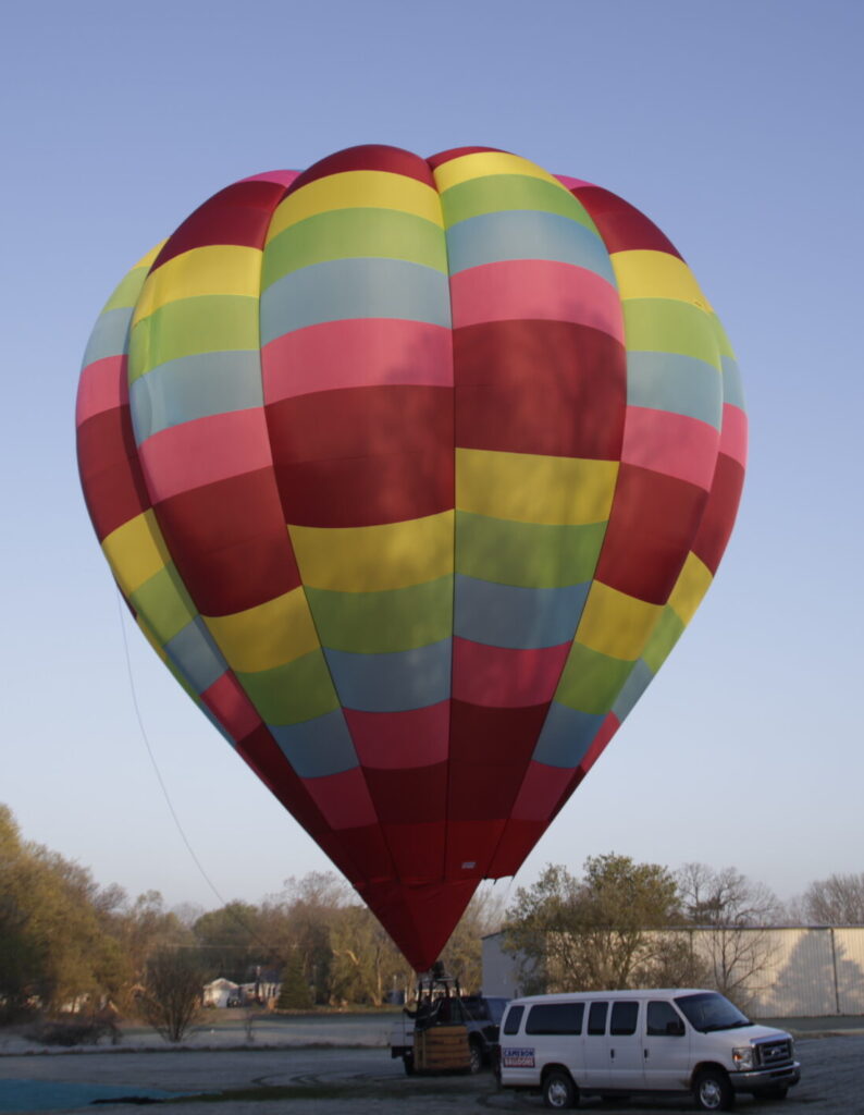 Cameron O-90 hot air balloon on ground in frosty environment