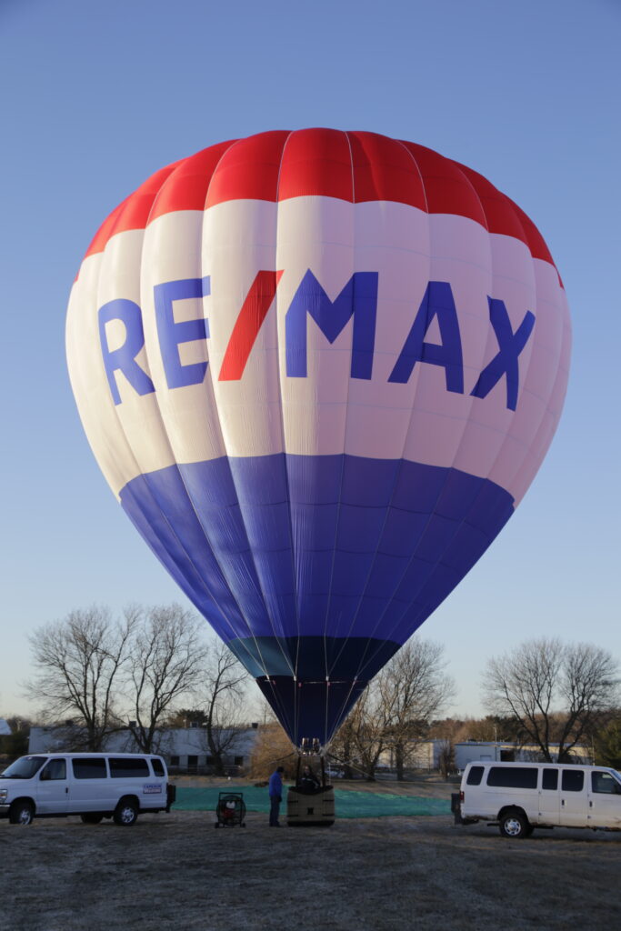 Custom appliqued Re/Max logo artwork on a Cameron Z-90 hot air balloon
