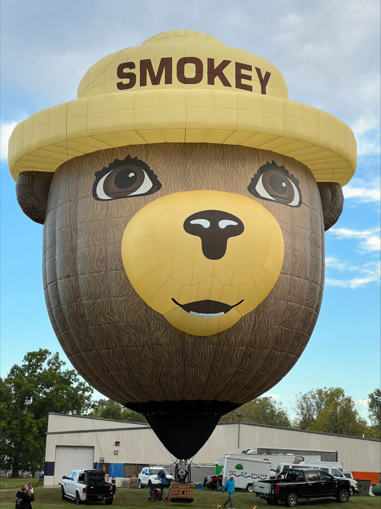 Smokey Bear inkjet printed special shape Cameron hot air balloon on ground