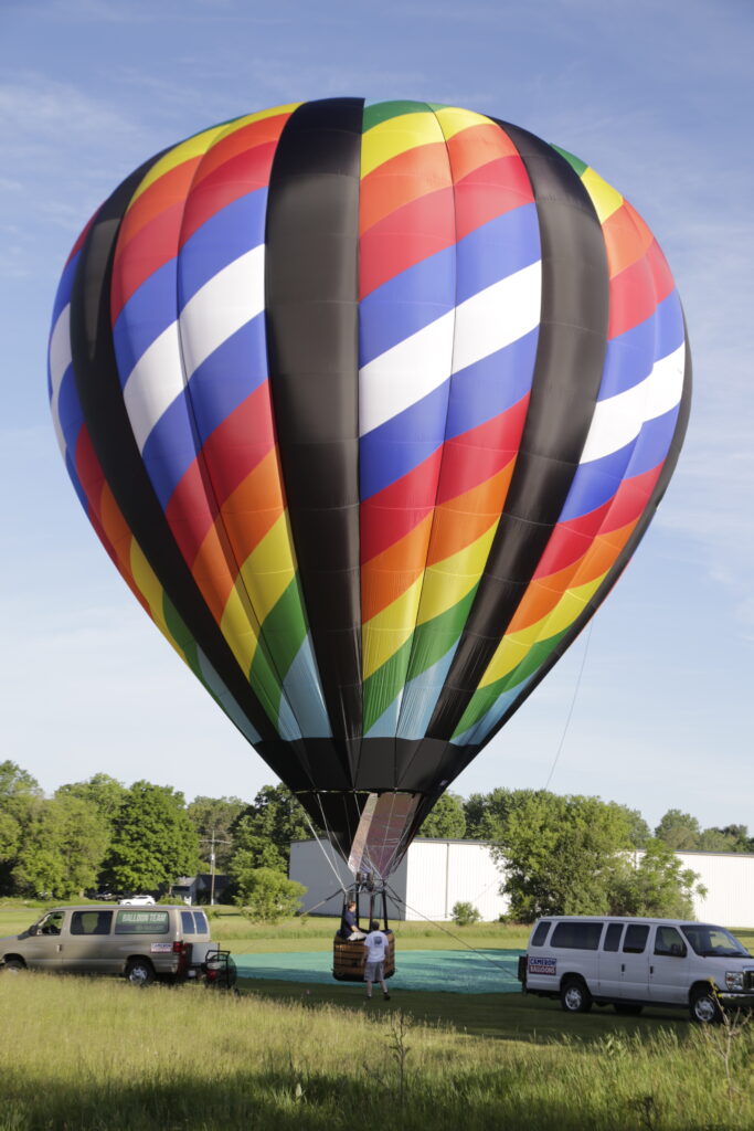 Cameron Z-77 hot air balloon with custom artwork on ground