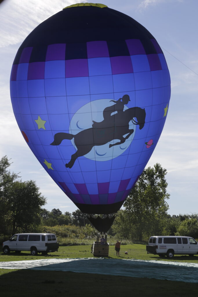 Custom inlayed equestrian and moon artwork on a Cameron ZL-70 hot air balloon