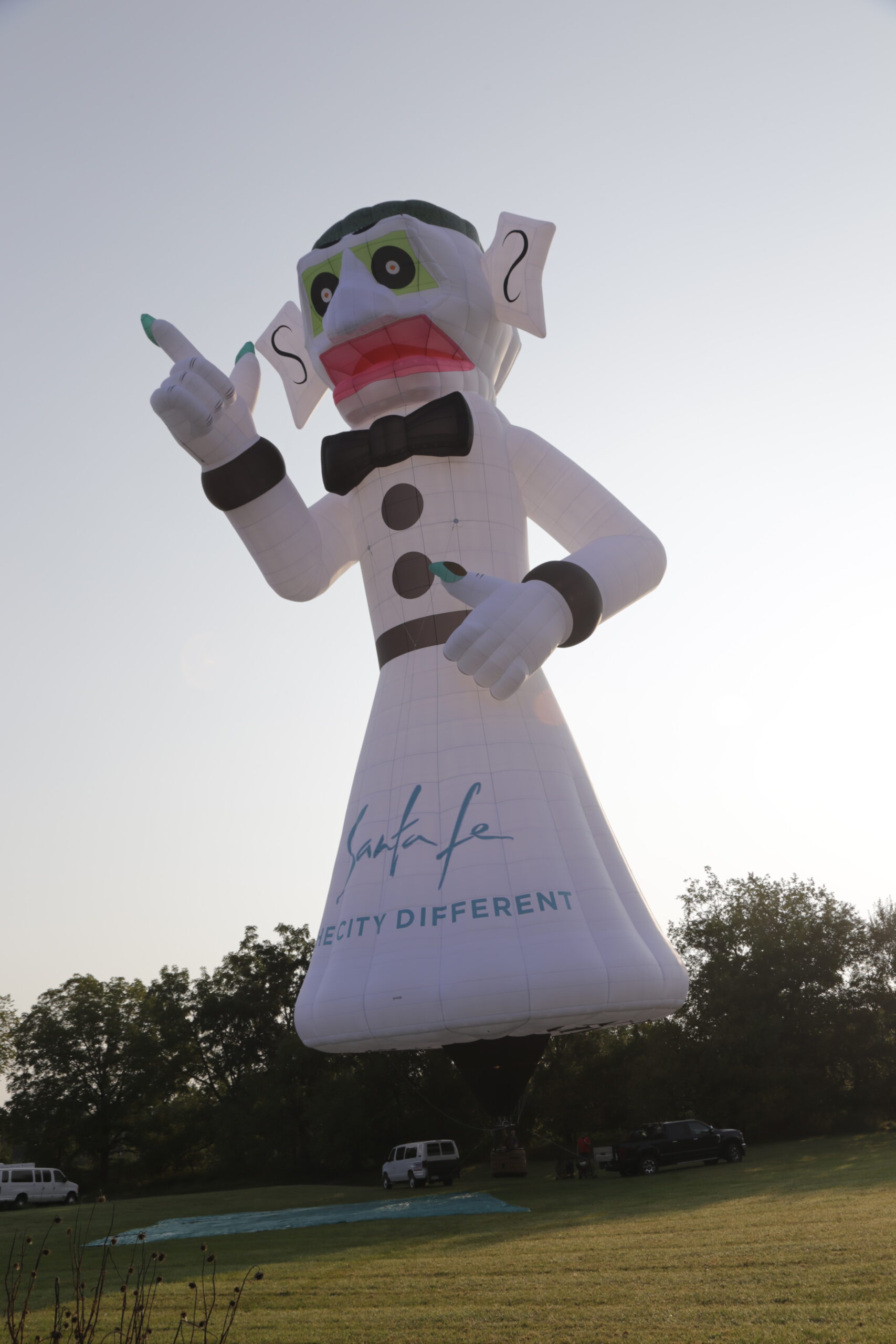 Zozobra special shape Cameron hot air balloon on ground with custom Santa Fe artwork