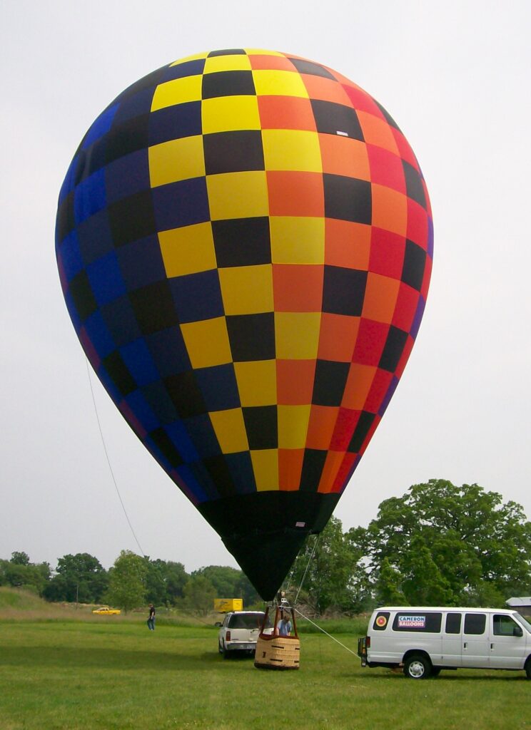 Cameron ZL-60 racer hot air balloon on ground in Spring