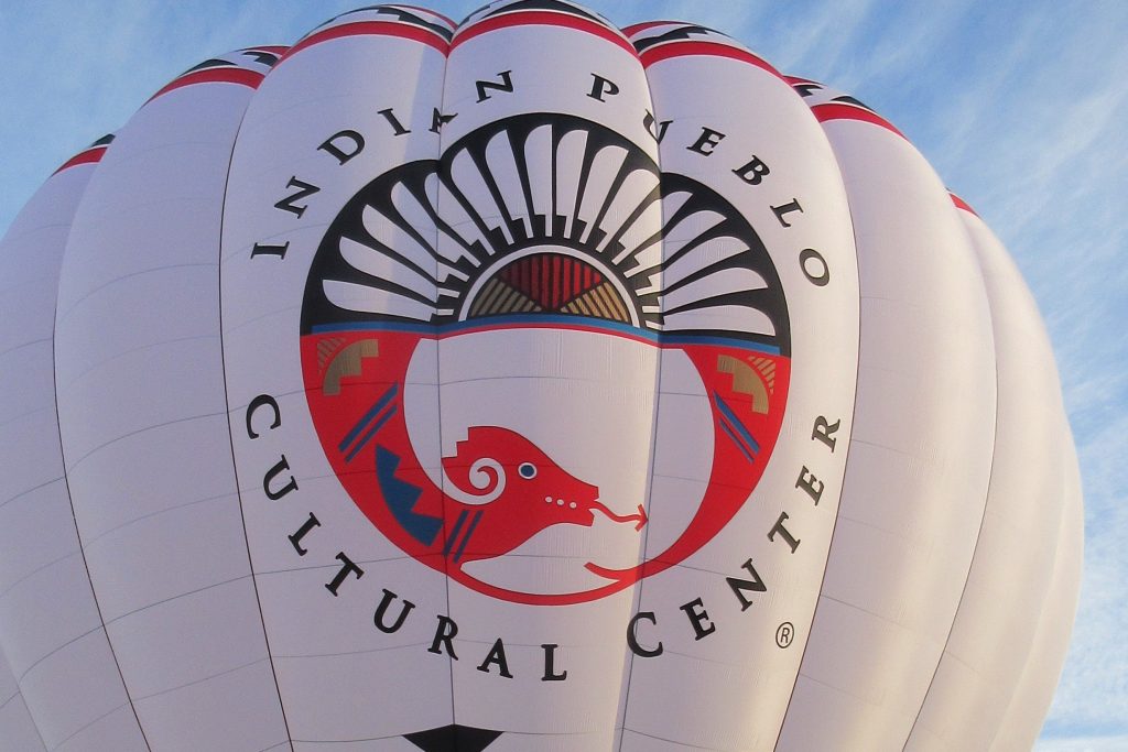 Appliqued Indian Pueblo Cultural Center logo on a Cameron A-Type hot air balloon