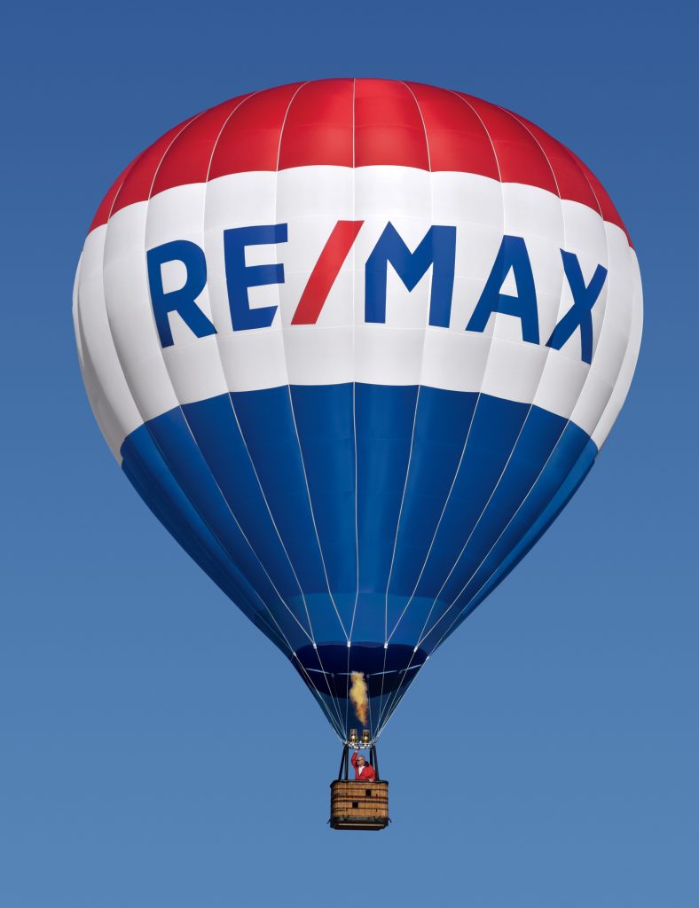 Cameron hot air balloon with Re/Max custom branding on ground