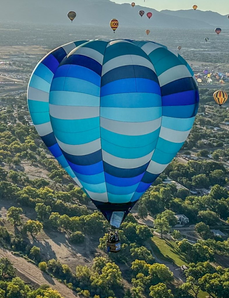 Cameron V-90 hot air balloon in flight over Albuquerque