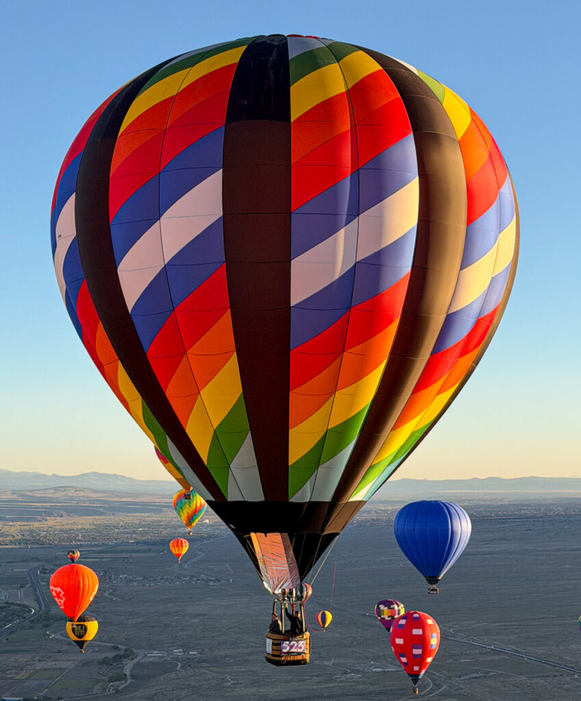 Cameron Z-77 hot air balloon in flight over Albuquerque